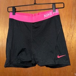 black nike pros with pink waist band